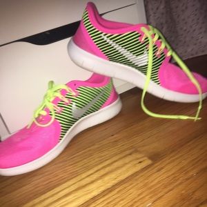 Neon Pink and neon green running sneakers